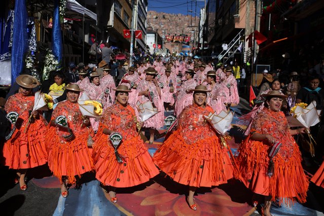 Women dance Morenada during Lord Of The Great Power festivity parade on May 25, 2024 in La Paz, Bolivia. This parade, which has been held in La Paz since 1930, mixes Catholicism and local traditions and folklore from the Andean region. (Photo by Gaston Brito/Getty Images)