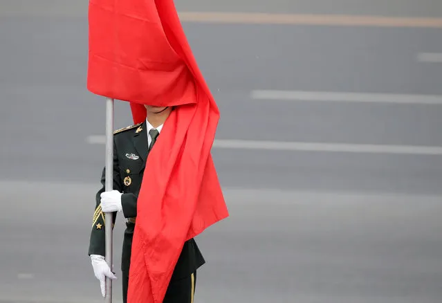 A soldier from honour guards attends a welcoming ceremony for Myanmar's President Htin Kyaw (not pictured) outside the Great Hall of the People in Beijing, China April 10, 2017. (Photo by Jason Lee/Reuters)