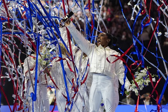 Simone Biles and the U.S. women celebrate as the 2024 team is named at the United States Gymnastics Olympic Trials on Sunday, June 30, 2024, in Minneapolis. (Photo by Abbie Parr/AP Photo)