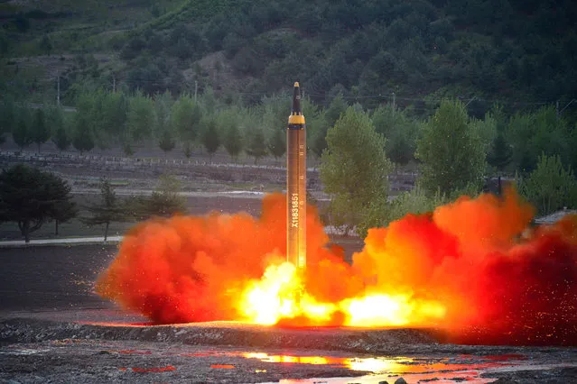 The long-range strategic ballistic rocket Hwasong-12 (Mars-12) is launched during a test in this undated photo released by North Korea's Korean Central News Agency (KCNA) on May 15, 2017. (Photo by Reuters/KCNA)