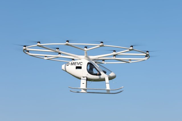 A Volocoptor X2 model is seen in a test flight during the official opening of a Volocopter hangar on April 04, 2023 in Bruchsal, Germany. Volocopter is developing two-seat multirotor aircraft for air taxi services. (Photo by Christian Kaspar-Bartke/Getty Images)