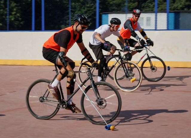 Enthusiasts play bike polo in Moscow, Russia on June 30, 2024. (Photo by Shamil Zhumatov/Reuters)