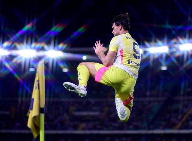 Dusan Vlahovic of Juventus celebrates scoring his team's first goal during the Serie A match between Hellas Verona and Juventus at Stadio Marcantonio Bentegodi on August 26, 2024 in Verona, Italy. (Photo by Daniele Mascolo/Reuters)