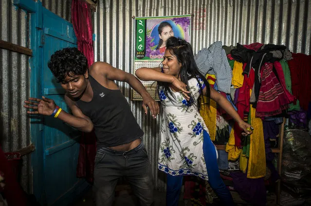 Bangladesh is one of the few Muslim countries in the world where prostitution is legal. The Kandapara brothel in the district of Tangail is the oldest and second-largest in the country – it has existed for some 200 years. Here: Priya teases a friend. (Photo by Sandra Hoyn)