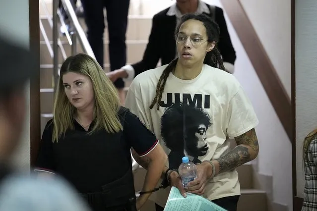 WNBA star and two-time Olympic gold medalist Brittney Griner is escorted to a courtroom for a hearing, in Khimki just outside Moscow, Russia, Friday, July 1, 2022. U.S. basketball star Brittney Griner is set to go on trial in a Moscow-area court Friday. The proceedings that are scheduled to begin Friday come about 4 1/2 months after she was arrested on cannabis possession charges at an airport while traveling to play for a Russian team. (Photo by Alexander Zemlianichenko/AP Photo)