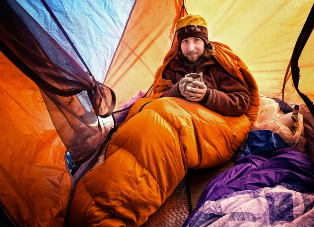 Russian Photographer Oleg Grigoriev in his tent. (Photo by Caters News/Oleg Grigoriev)