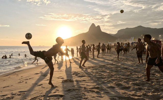 People packed Ipanema beach in Rio, Brazil, in scorching conditions on Sunday, January 19, 2025, some playing Altinha, a popular beach football game. (Photo by Bob Karp/Alamy Live News)