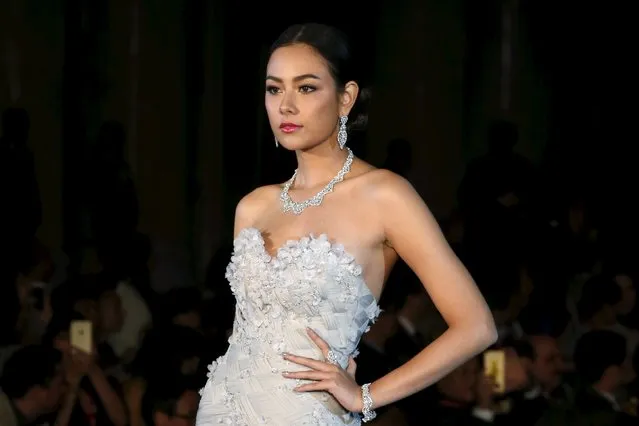 A model displays jewerly at the 56th Bangkok Gems and Jewelry Fair at Muang Thong Tahni in Bangkok, Thailand, September 10, 2015. (Photo by Chaiwat Subprasom/Reuters)