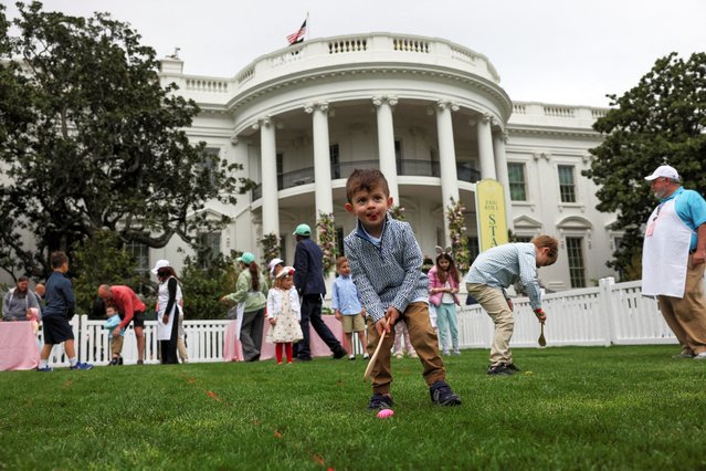 Children participate in the egg roll, during the annual White House Easter Egg Roll event, on the South Lawn of the White House, on April 21, 2025. (Photo by Leah Millis/Reuters)