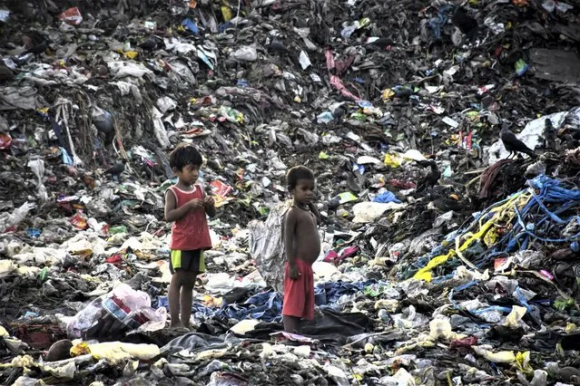 Girls who take extreme health risks work for very low daily wages at Halishahar Garbage Dumping Station in Chittagong, Bangladesh on October 08, 2022. (Photo by Mohammad Shajahan/Anadolu Agency via Getty Images)