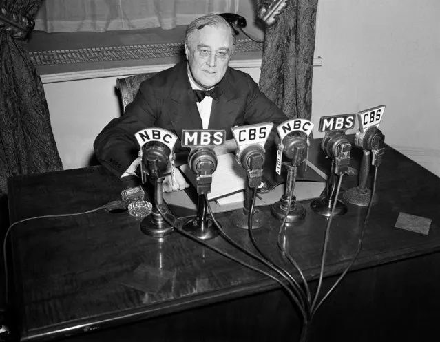 In this February 27, 1941 file photo President Franklin D. Roosevelt speaks on the radio from the Oval Room of the White House. During an extraordinary 12 years in office, Roosevelt guided the nation through a bleak period of Depression-era unemployment, a severe Midwest drought known as the Dust Bowl and battle against the Nazis and Japanese in World War II. (Photo by Henry Griffin/AP Photo/File)