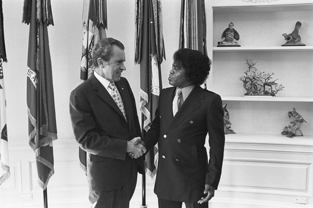 Richard Nixon shakes hands with musician James Brown in the White House's Oval Office. Brown performed at the “All-American Gala” Nixon's Inauguration in 1969. (Photo by PhotoQuest/Getty Images)