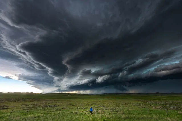 A photographer has weathered some of America's most violent storms to capture these stunning snaps. Storm chaser Mike Mezeul II, 30, has traveled all over the US to shoot the likes of mammoth thunderstorms and surreal cloud patterns. His incredible collection of storm images are the result of more than 15 years of photography and thousands of miles of travel. (Photo by Mike Mezeul II/Caters News)