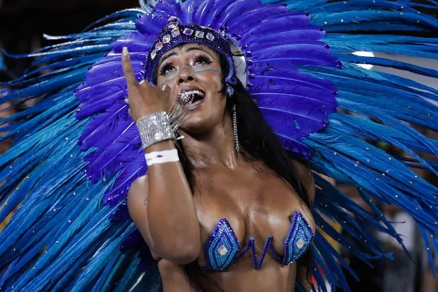 Members of the Unidos da Tijuca samba school parade at the “Opening of Carnival 2022” event, at the Cidade do Samba, in Rio de Janeiro, Brazil, 27 February 2022. The event is a preview of the parades of the Samba Schools of the Special Group, postponed to April due to the COVID-19 pandemic in Brazil. (Photo by Andre CoelhoEPA/EFE)