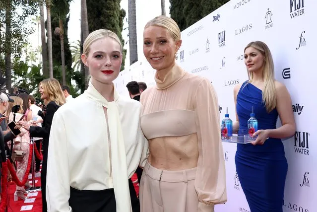 (L-R) American actresses Elle Fanning and Gwyneth Paltrow with FIJI Water at the 7th Annual Fashion Los Angeles Awards at The Beverly Hills Hotel on April 23, 2023 in Beverly Hills, California. (Photo by Tommaso Boddi/Getty Images for FIJI Water)