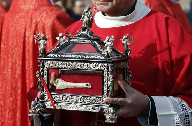 The Relics of Saint Devote are presented in the square during the traditional Sainte Devote celebration procession in Monaco, January 27, 2015. Sainte Devote, the country's patron saint, is a cherished part of Monegasque heritage. (Photo by Eric Gaillard/Reuters)