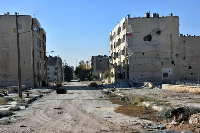 Damaged buildings are pictured in Hanano housing district after government forces took control of the area in Aleppo, Syria in this handout picture provided by SANA on November 27, 2016. (Photo by Reuters/SANA)