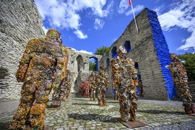 “Trash People” sculptures are seen at opening event for the Blaue Burg (Blue Castle) by artist HA Schult on August 4, 2023 in Bad Lippspringe near Paderborn, Germany. (Photo by Sascha Schuermann/Getty Images for HA Schult – Kulturfonds Bad Lippspringe)