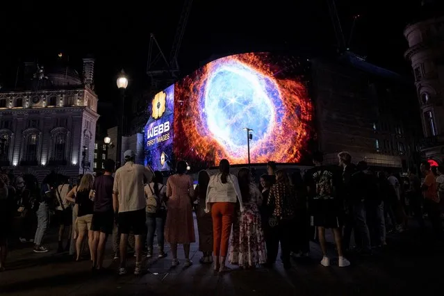 A general view of the broadcast of NASA's first images from James Webb Space Telescope to screens in Picadilly Circus on July 12, 2022 in London, England. The imagery from the James Webb Space Telescope was also broadcast to screens in Times Square as part of a global collaboration between Landsec and NASA. (Photo by Ricky Vigil/Getty Images)