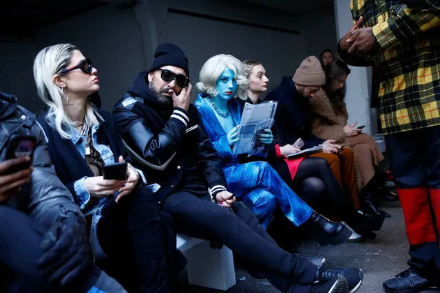 People attend the C2H4 catwalk show at London Fashion Week Men's in London, Britain January 6, 2019. (Photo by Henry Nicholls/Reuters)