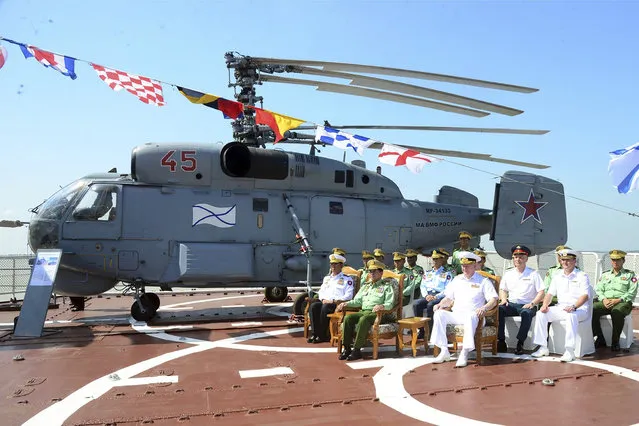In this photo released from the The Military True News Information Team on November 6, 2023, Senior Gen. Min Aung Hlaing, center, leader of ruling military council, attends together with Russian Navy Commander-in-chief Admiral Nikolai Yevmenov, center right, during opening ceremony of first Myanmar Russia Maritime Security Exercise at Thilawa port in Yangon, Myanmar. (Photo by The Military True News Information Team via AP Photo)