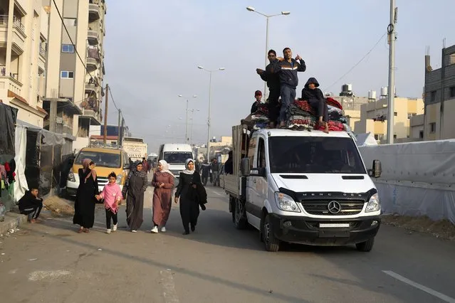 Palestinians fleeing the Israeli bombardment of the Gaza Strip arrive in Rafah Wednesday, December 27, 2023. (Photo by Hatem Ali/AP Photo)