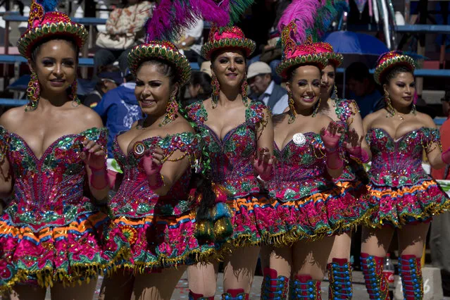 Women perform in the traditional “Morenada” dance during Carnival, in Oruro, Bolivia, Saturday, March 2, 2019. (Photo by Juan Karita/AP Photo)