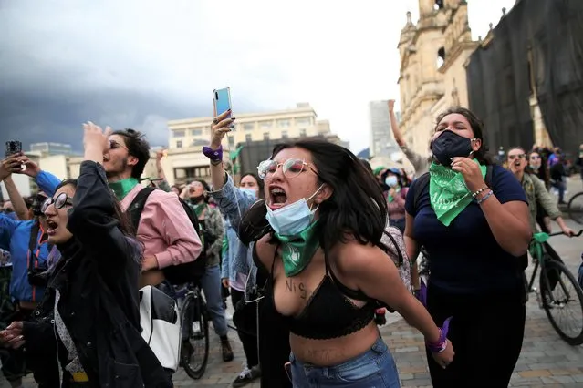 Demonstrators react during a rally in support of legal and safe abortion and to mark the International Safe Abortion Day in Bogota, Colombia on September 28, 2021. (Photo by Luisa Gonzalez/Reuters)