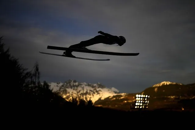 Andreas Wellinger of Germany soars through the air during the fourth stage of the 72th Four Hills ski jumping tournament in Bischofshofen, Austria, Friday, January 5, 2024. (Photo by Matthias Schrader/AP Photo)