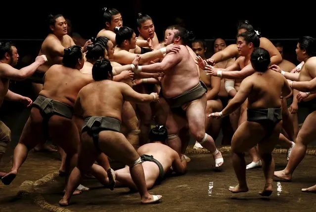 Sumo wrestlers of Nishonoseki clan appeal to the winner of a training bout for the next opponent during a joint training session ahead of the May Grand Sumo Tournament in Tokyo May 2, 2015. (Photo by Toru Hanai/Reuters)