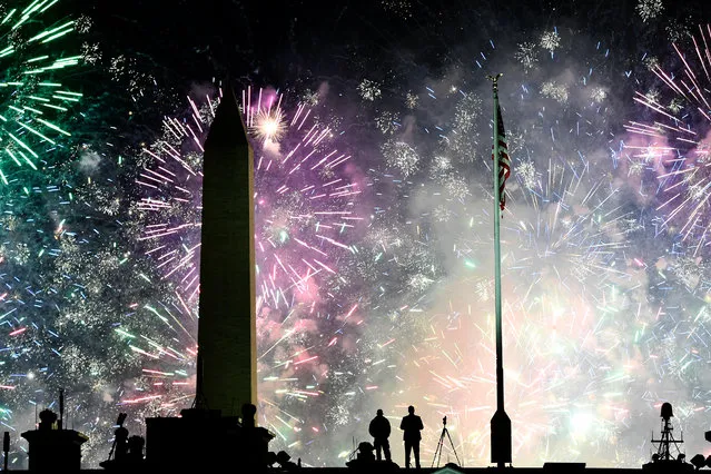 Fireworks are seen above the White House at the end of the Inauguration day for US President Joe Biden in Washington, DC, on January 20, 2021. (Photo by Patrick T. Fallon/AFP Photo)