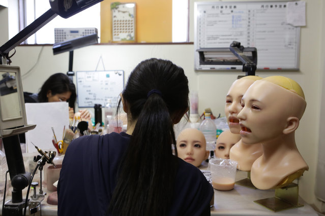 Make-up painters prepares the love dolls on March 9, 2017 in Tokyo, Japan. (Photo by Taro Karibe/Getty Images)