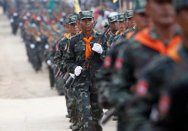 Soldiers from the Shan State Army-South march in formation during a military parade celebrating the 69th Shan State National Day at Loi Tai Leng, the group's headquarters, on the Thai-Myanmar border February 7, 2016. (Photo by Soe Zeya Tun/Reuters)