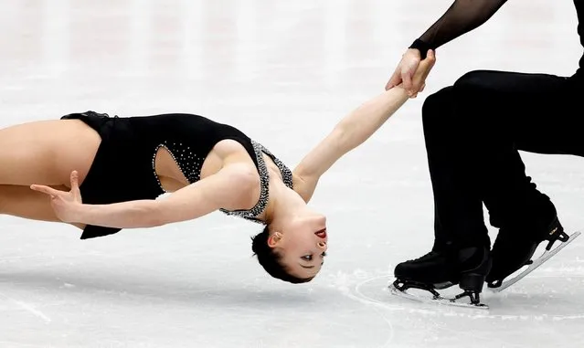 Dorota Broda and Pedro Betegon Martin of Spain perform in the pairs free program at the Figure Skating World Championships in Montpellier, south of France, Thursday, March 24, 2022. (Photo by Juan Medina/Reuters)