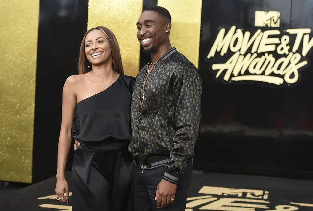 Kat Graham, left, and Demetrius Shipp Jr. arrive at the MTV Movie and TV Awards at the Shrine Auditorium on Sunday, May 7, 2017, in Los Angeles. (Photo by Jordan Strauss/Invision/AP Photo)