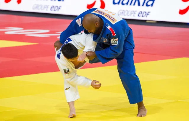 Teddy Riner (FRA) in blue competes against Kokoro Kageura (JPN) in white during the Paris Grand Slam at AccorHotels Arena on Sunday, February 09, 2020 in Paris, France. (Photo by Henri Collot/SIPA Press)