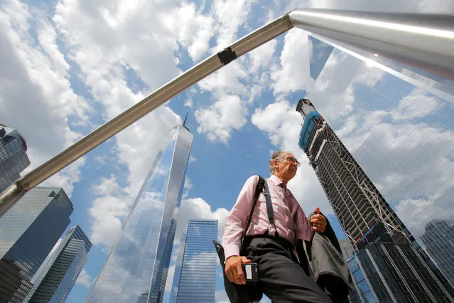 Local businessman Claude F. Gallello passes through the newly opened Liberty Park above Liberty Street on the World Trade Center site in the Manhattan borough of New York, U.S., June 29, 2016. (Photo by Andrew Kelly/Reuters)