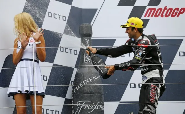 Ajo Motorsport Moto2 rider Johann Zarco of France celebrates his win during the British Grand Prix at the Silverstone Race Circuit, Britain August 30, 2015. (Photo by Darren Staples/Reuters)