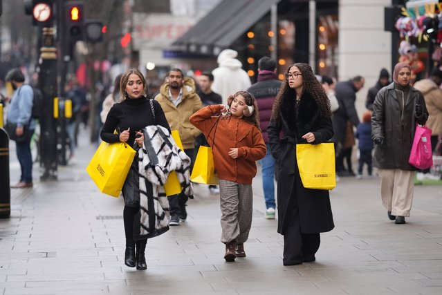 Last-minute shoppers on Christmas Eve in Oxford Street in central London on Tuesday, December 24, 2024. (Photo by Yui Mok/PA Images via Getty Images)