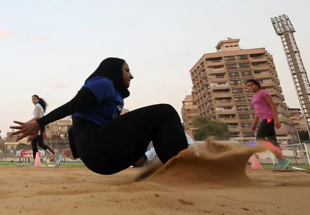 Esraa Owis, 24, a member of the Egyptian national team and Al Ahly club in long jump, attends a training session after overcoming an ankle injury to achieve the first Egyptian silver medal in long jump during the 2022 Mediterranean Games, at the Olympic Center For Training National Teams in Maadi, a suburb of Cairo, Egypt on July 20, 2022. (Photo by Amr Abdallah Dalsh/Reuters)