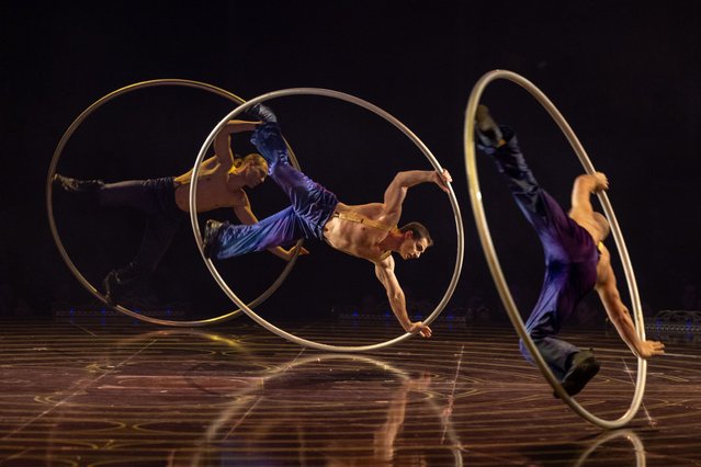 Roues Cyr performers ride the mono wheel during the dress rehearsal for Cirque du Soleil's “Corteo” at Royal Albert Hall on January 08, 2025 in London, England. (Photo by Shane Anthony Sinclair/Getty Images)