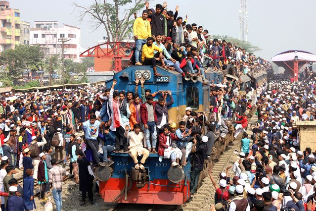 Muslims are returning in an overcrowded train after Bishwa Ijtema at Tongi railway station in Gazipur, Bangladesh on February 4, 2024. Bishwa Ijtema (world Ijtema) is the second largest muslim gathering in the world. Millions of people from all over the country and abroad participate in Ijtema every year. (Photo by Syed Mahabubul Kader/ZUMA Press Wire/Rex Features/Shutterstock)