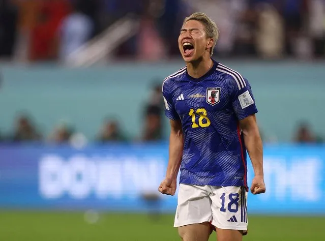 Takuma Asano of Japan celebrates victory after the final whistle during the FIFA World Cup Qatar 2022 Group E match between Japan and Spain at Khalifa International Stadium on December 1, 2022 in Doha, Qatar. (Photo by Paul Childs/Reuters)