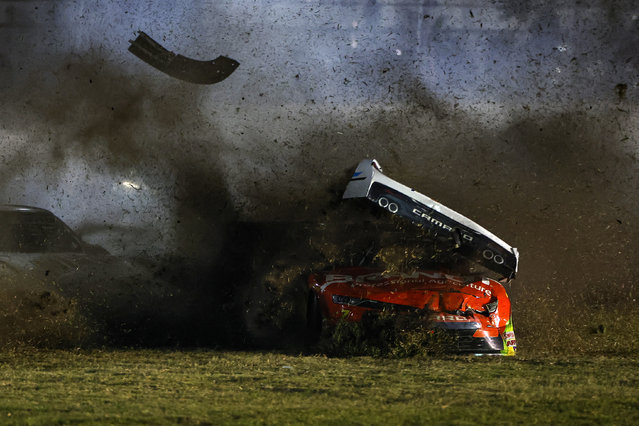 Justin Allgaier, driver of the #7 BRANDT Chevrolet, spins into the infield grass after an on-track incident during the NASCAR Xfinity Series United Rentals 300 at Daytona International Speedway on February 19, 2024 in Daytona Beach, Florida. (Photo by James Gilbert/Getty Images/AFP Photo)