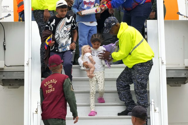 Venezuelan migrants arriving from Mexico deplane at the Simon Bolivar International Airport in Maiquetia, Venezuela, Thursday, March 20, 2025, after abandoning hopes of reaching the U.S. due to President Trump's crackdown on migration. (Photo by Ariana Cubillos/AP Photo)