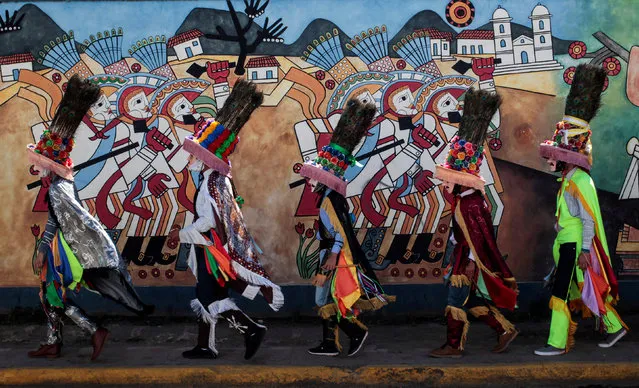 Dancers prepare to participate in the celebration of the feast honoring Saint Sebastian in Diriamba, Nicaragua January 7, 2018. (Photo by Oswaldo Rivas/Reuters)