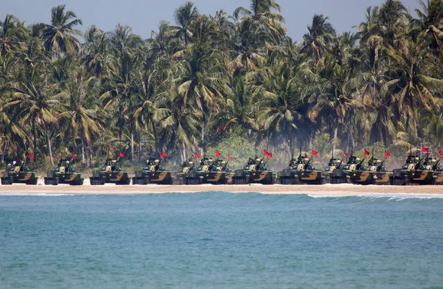 Myanmar military troops take part in a military exercise at Ayeyarwaddy delta region in Myanmar, February 3, 2018. (Photo by Lynn Bo Bo/Reuters)