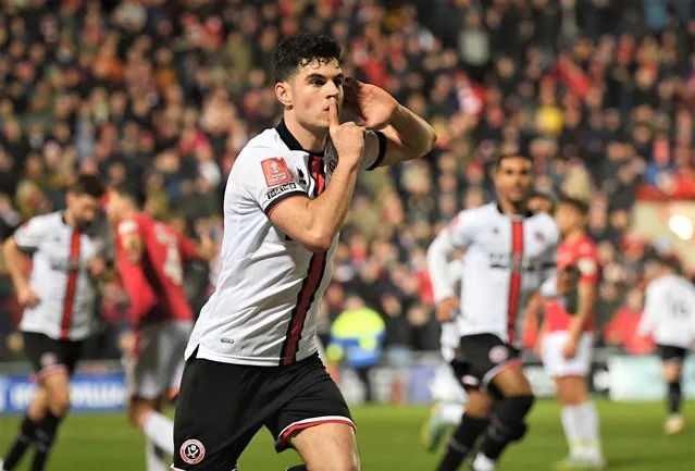 John Egan of Sheffield Utd celebrates the equaliser (3-3) during the The FA Cup match at the Racecourse Stadium in Wrexham, Wales on January 29, 2023. (Photo by Gary Oakley/Sportimage/Alamy Live News)
