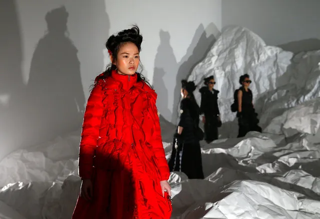 Models present creations from the Moncler Autumn/Winter 2018 women collection during Milan Fashion Week in Milan, Italy February 20, 2018. (Photo by Tony Gentile/Reuters)