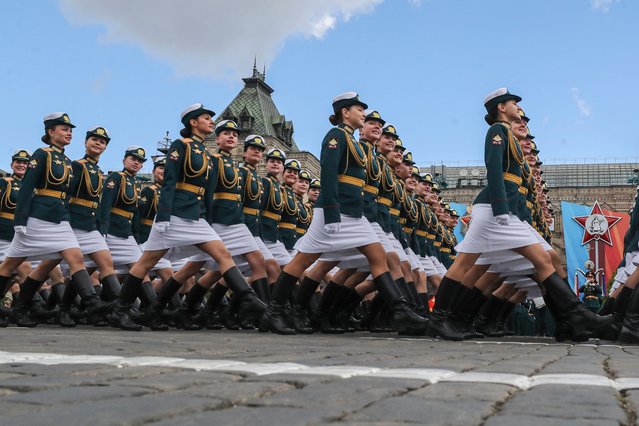 Russian servicewomen take part in the Victory Day military parade rehearsal at the Red Square in Moscow, Russia, on Sunday, May 5, 2024. The parade will take place at Moscow's Red Square on May 9 to celebrate 79 years of the victory in WWII. (Photo by Maxim Shipenkov/AP Photo)